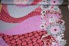 Viskose Jersey Stoff Blumen rosa-grau